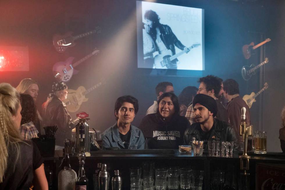 Viveik Karla, left, director Gurinder Chadha and Aaron Phagura on the set of "Blinded by the Li ...