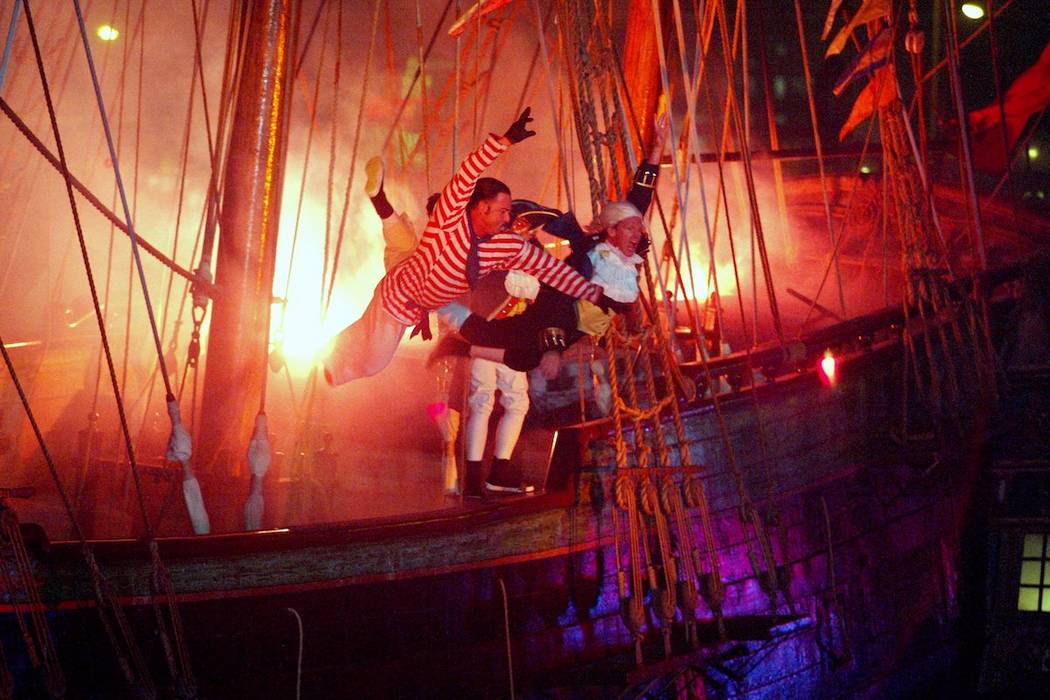 A Pirate show cast members takes their last dive of the of the British ship before thousands of ...