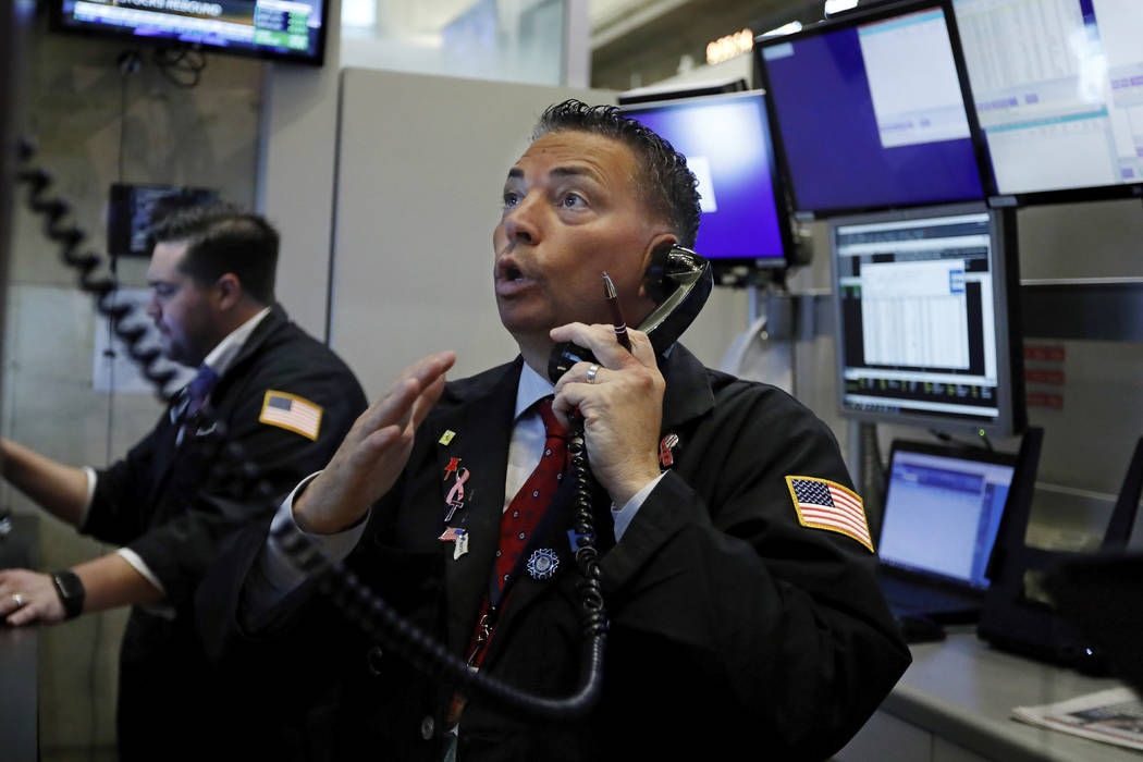 Trader Jonathan Mueller works on the floor of the New York Stock Exchange on Aug. 6, 2019. (AP ...