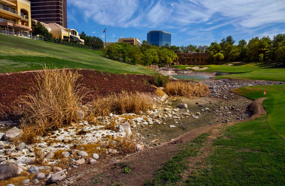 A stream and waterfall feature are shown under construction at Wynn Golf Club on Tuesday, July ...