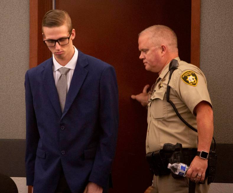 Kody Harlan walks back for the verdict in his murder trial at the Regional Justice Center on We ...