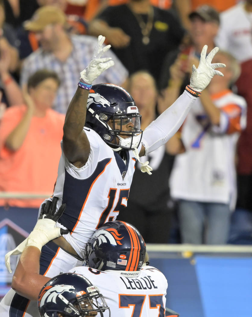 Denver Broncos wide receiver Juwann Winfree celebrates after catching a touchdown pass during t ...