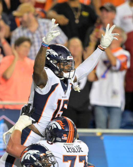 Denver Broncos wide receiver Juwann Winfree celebrates after catching a touchdown pass during t ...