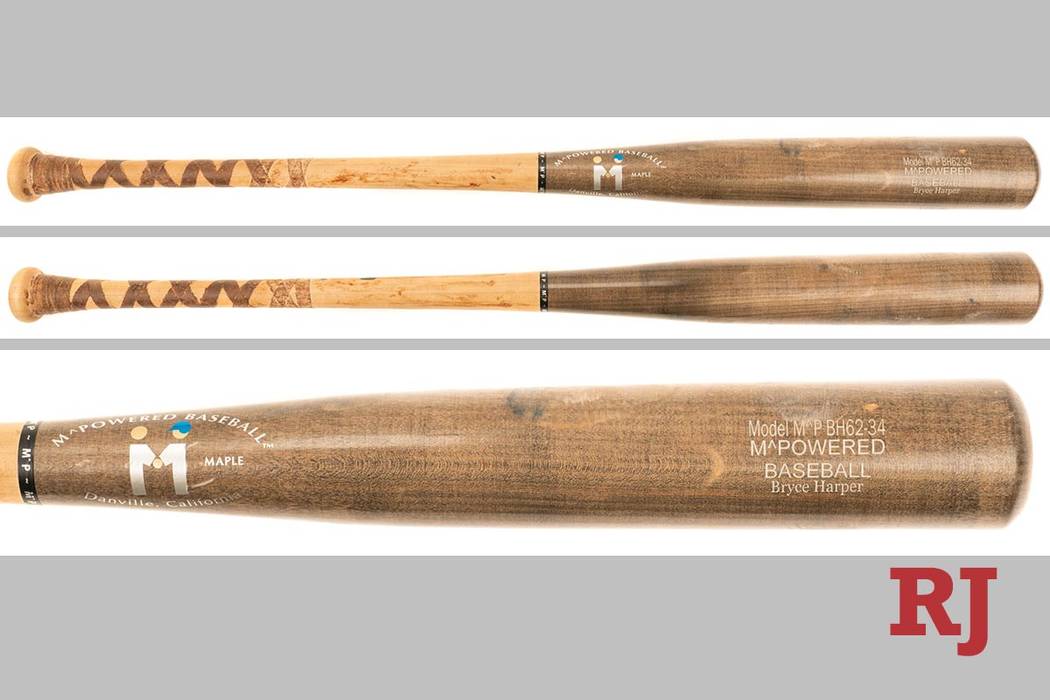 A bat used by Bryce Harper during his career at Las Vegas High School is up for auction. (Rober ...
