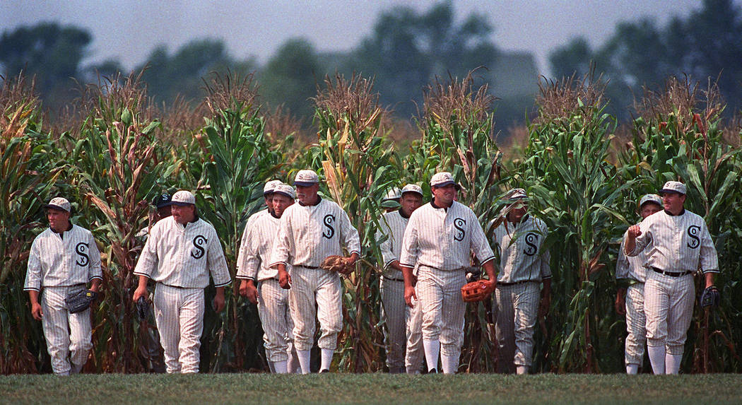 In this July 22, 1977, file photo, people portraying ghost players emerge from a cornfield as t ...