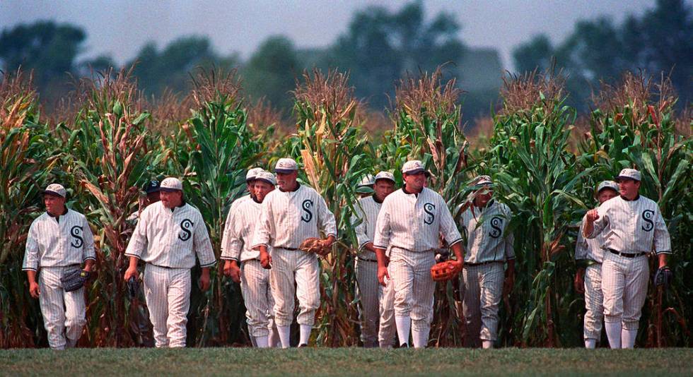 In this July 22, 1977, file photo, people portraying ghost players emerge from a cornfield as t ...