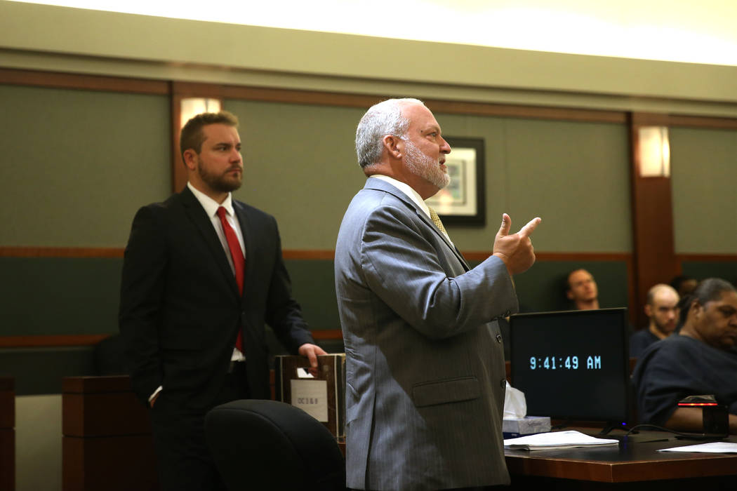 Chief Deputy District Attorney Marc Digiacomo, right, with prosecutor Jory Scarborough, gives h ...