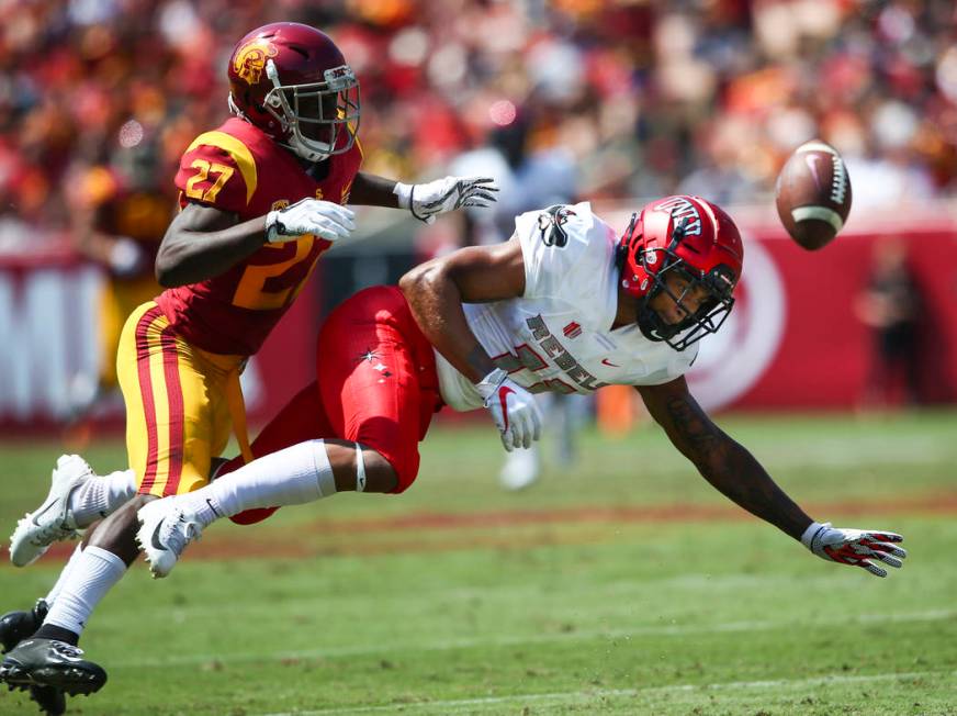 USC Trojans cornerback Ajene Harris (27) breaks up a pass intended for UNLV Rebels wide receive ...