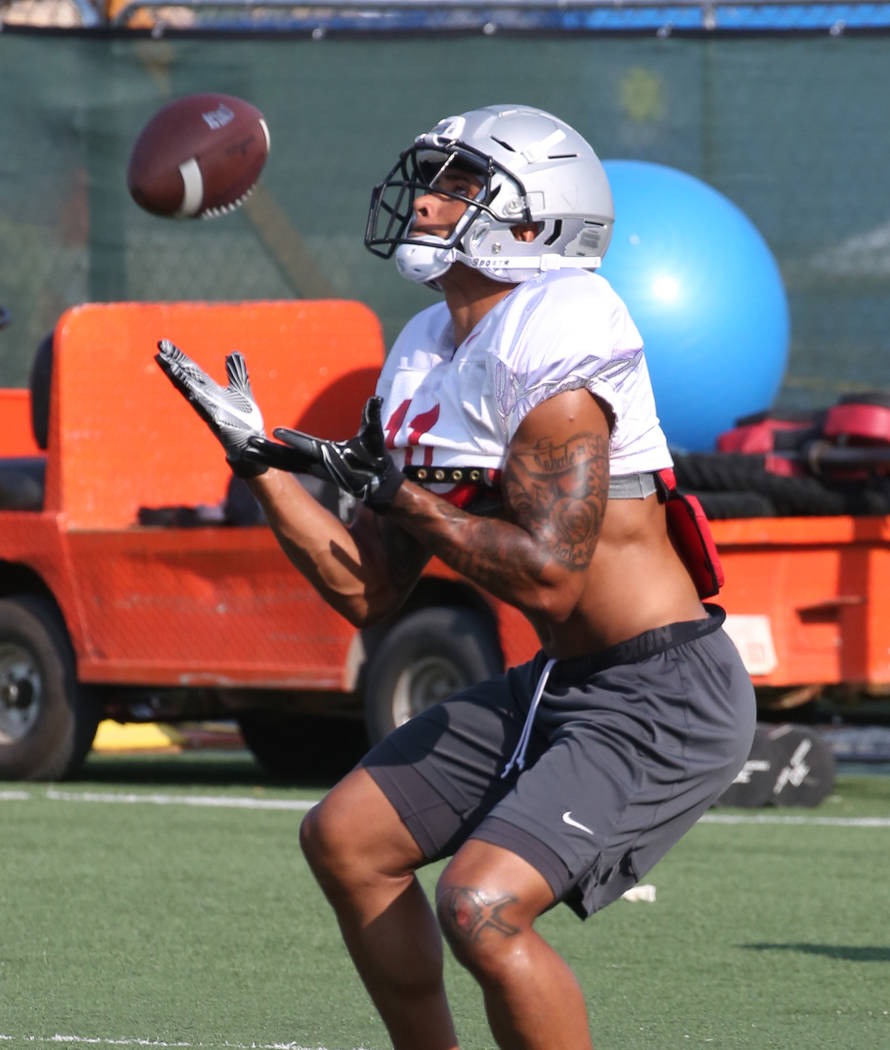 UNLV wide receiver Drew Tejchman prepares to catch the ball during team practice on Thursday, A ...