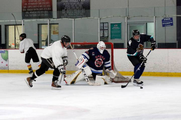 Ronnie's Hockey Club plays a pickup ice hockey game at the Las Vegas Ice Center in Las Vegas on ...