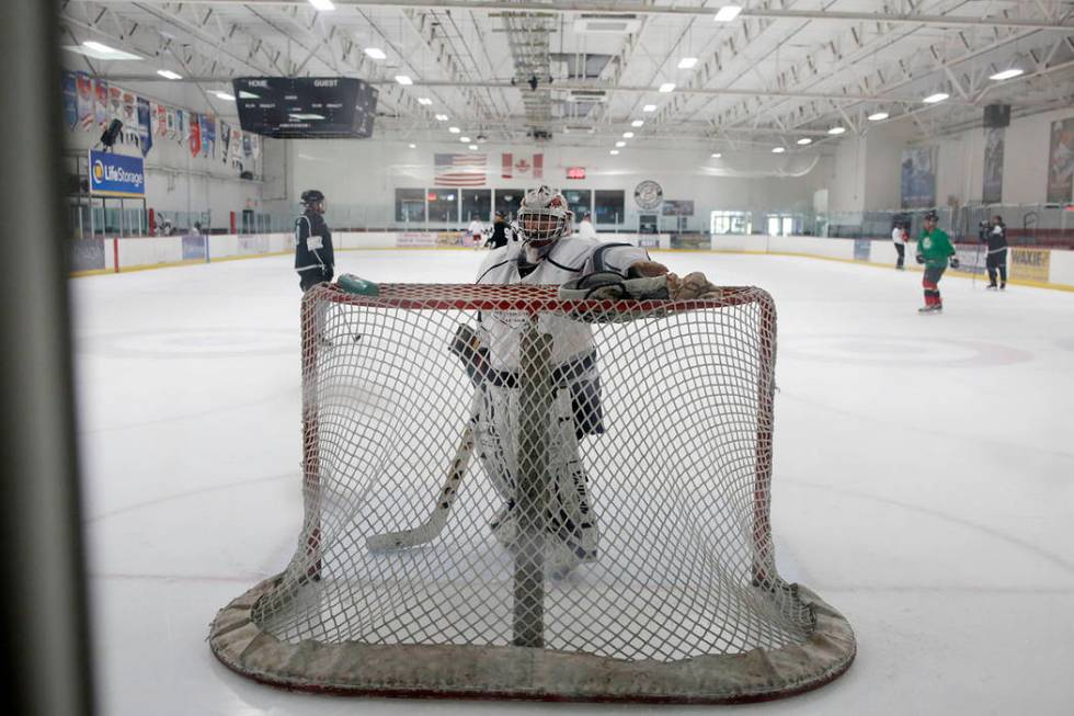 Goalie Dave Holm, 76, during Ronnie's Hockey Club, a pickup ice hockey league at the Las Vegas ...