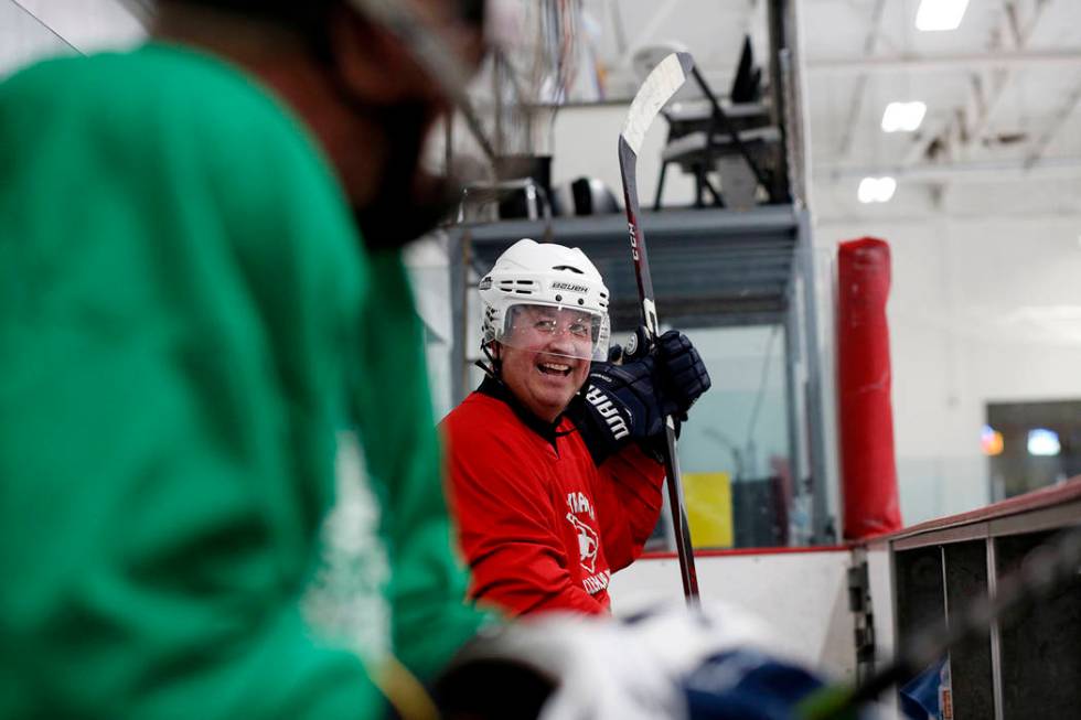Player Sean Glenn Burgess waits to go back onto the ice during Ronnie's Hockey Club, a pickup ...