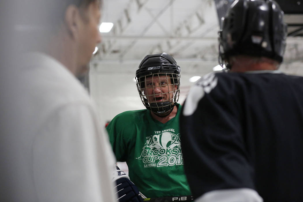 Player Sean McCrossan comes off of the ice during Ronnie's Hockey Club, a pickup ice hockey lea ...
