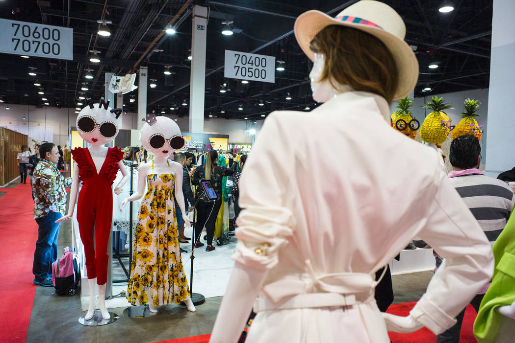 A view of colorfully clothed mannequins at the INA booth during the Sourcing at MAGIC trade sho ...