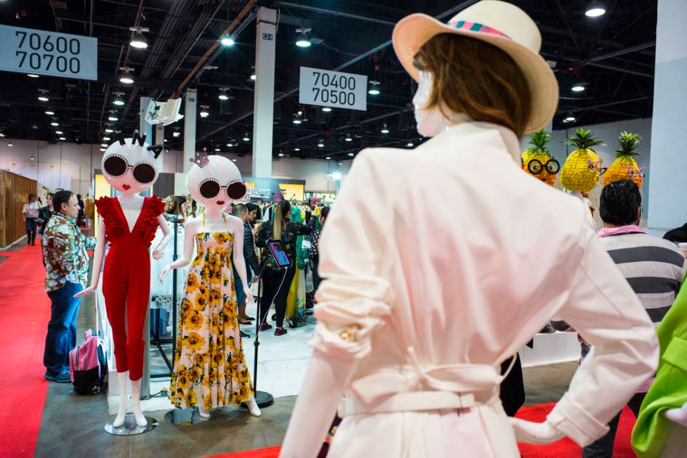 A view of colorfully clothed mannequins at the INA booth during the Sourcing at MAGIC trade sho ...