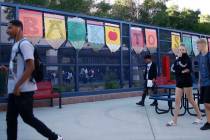 Students head to class on the first day of school at Liberty High School in Henderson, Monday, ...