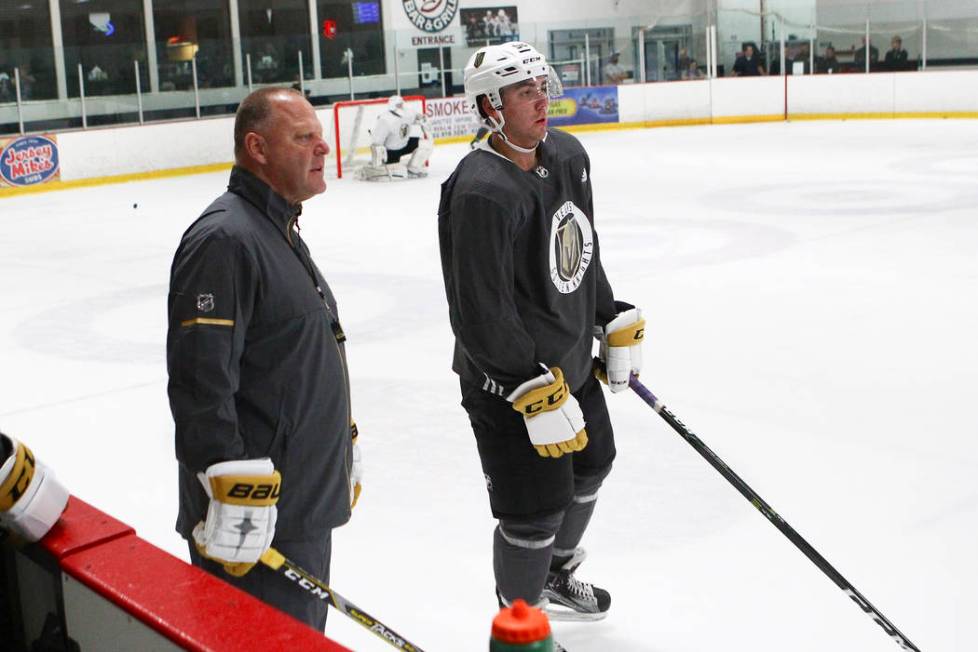 Vegas Golden Knights head coach Gerard Gallant, left, and forward Jack Dugan during the team's ...