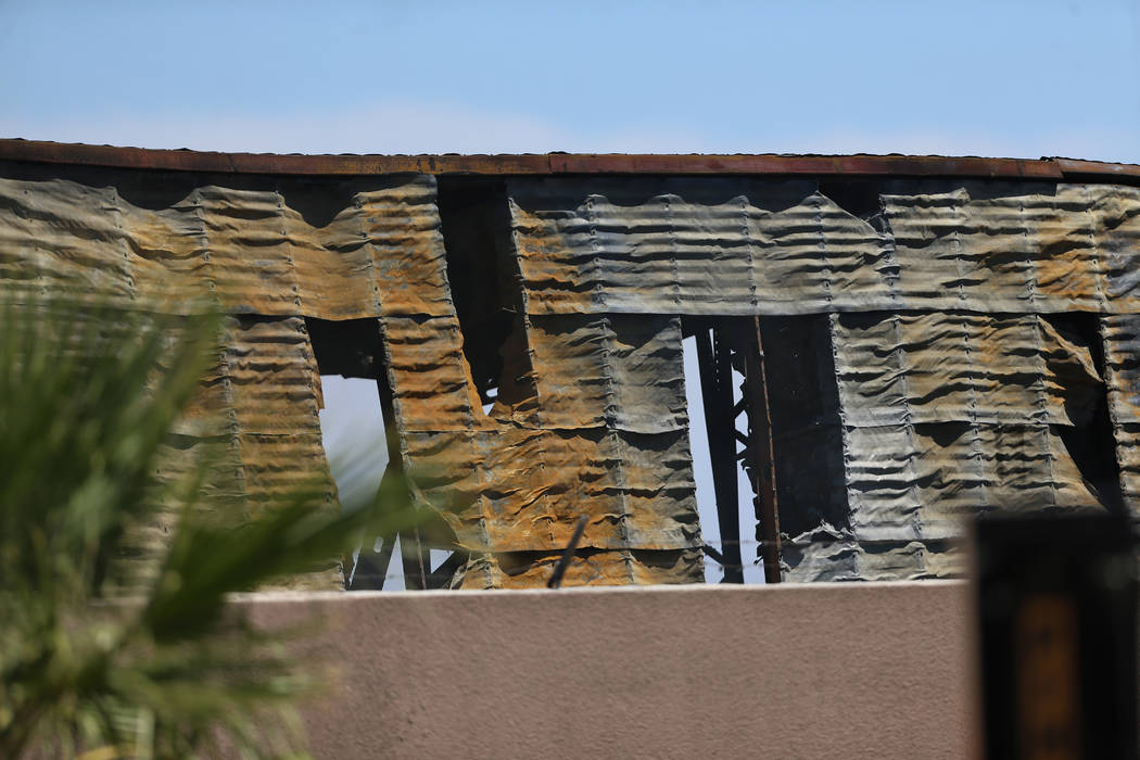The scene of a structural fire near the intersection of Losee Road and West Lake Mead Boulevard ...