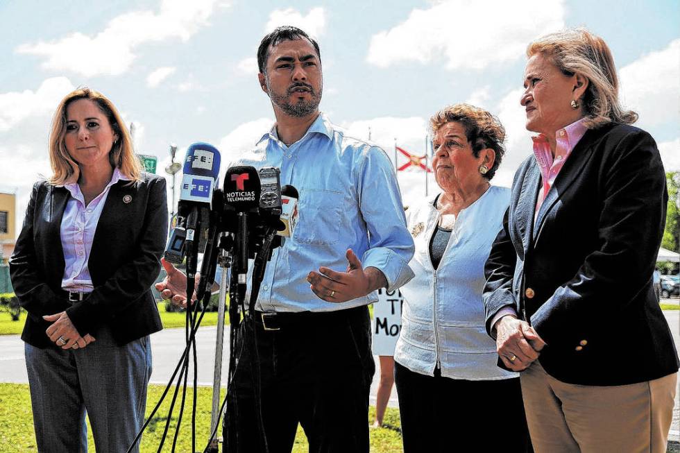 Rep. Joaquin Castro, D-TX., center, Chairman of the Congressional Hispanic Caucus, speaks to me ...