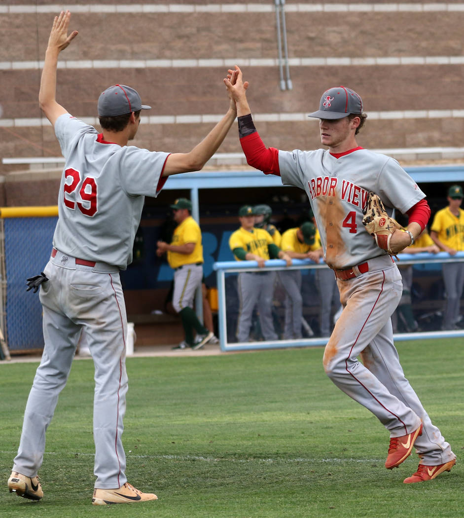 Arbor View baseball players Brennan Holligan, left, and Brad Stone, who were teammates on the M ...