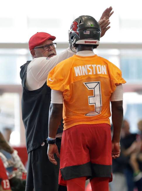 Tampa Bay Buccaneers head coach Bruce Arians talks to quarterback Jameis Winston (3) during an ...