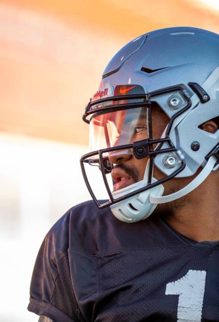 UNLV QB Armani Rogers (1) looks to his teammates during their first major scrimmage of football ...