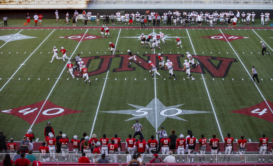 UNLV QB Armani Rogers (1) breaks free for a long run during their first major scrimmage of foot ...