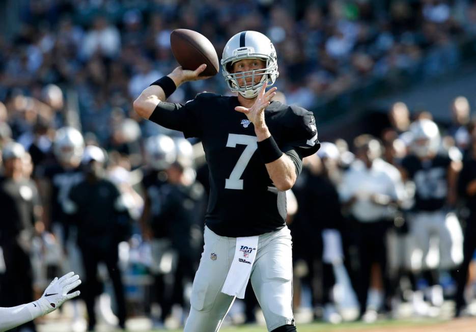 Oakland Raiders quarterback Mike Glennon throws a pass against the Los Angeles Rams during the ...