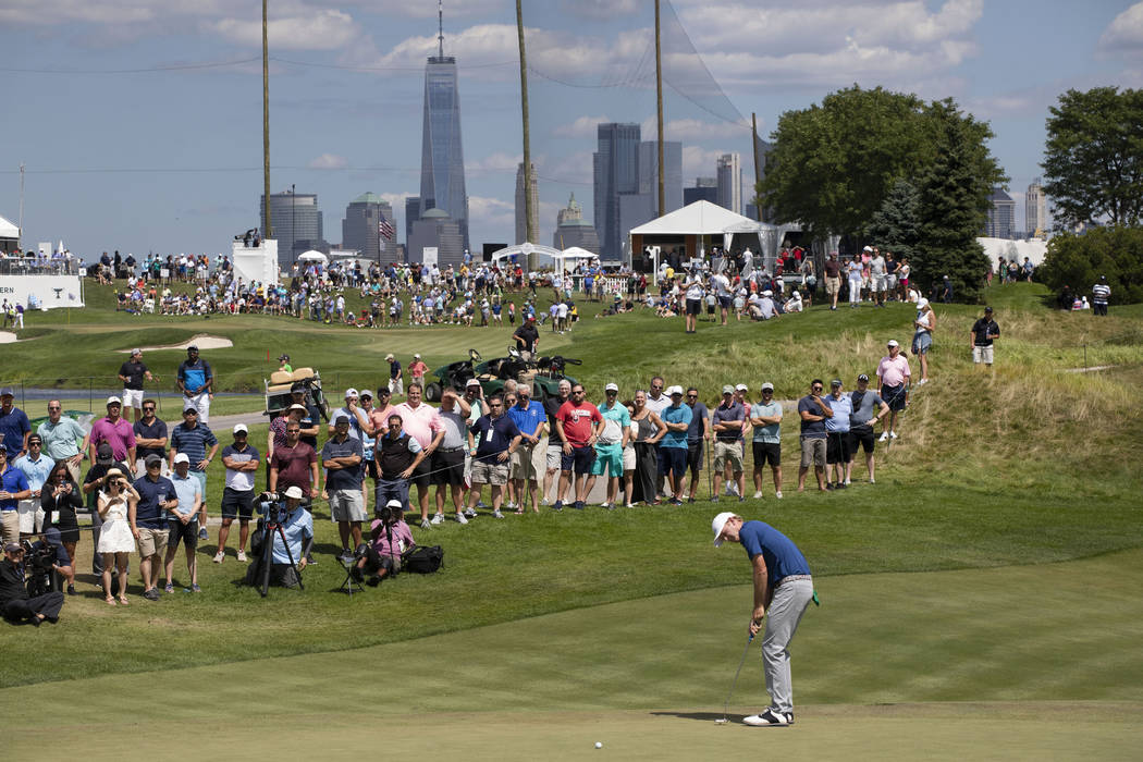 Brandt Snedeker putts on the third hole in the final round of the Northern Trust golf tournamen ...