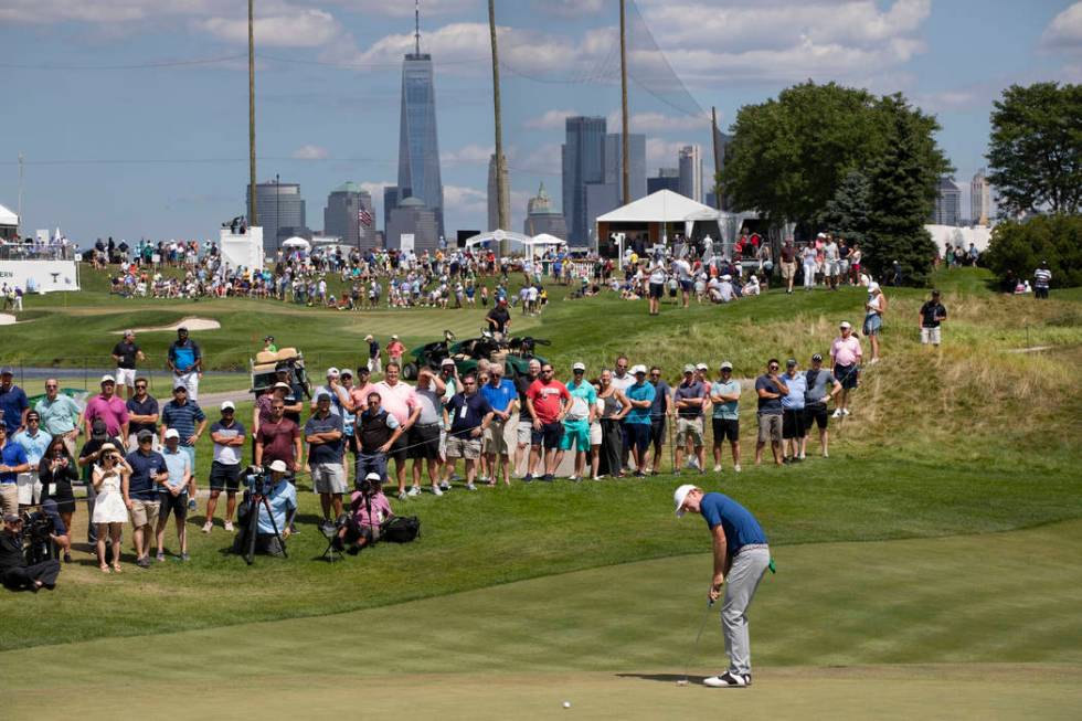 Brandt Snedeker putts on the third hole in the final round of the Northern Trust golf tournamen ...