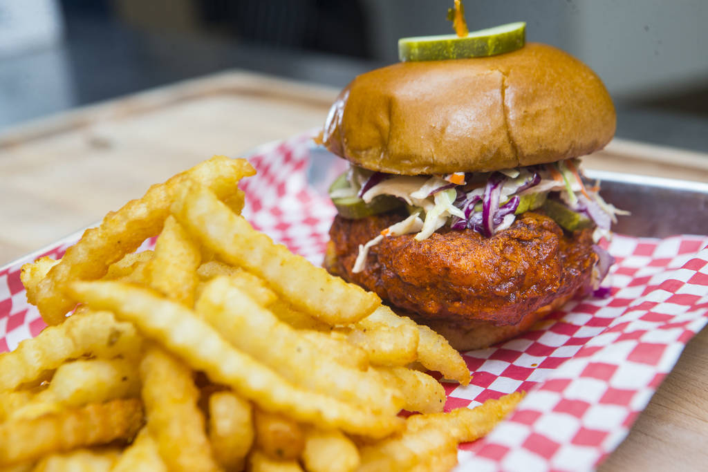 Hot chicken sandwich by Hattie B's at Block 16 Urban Food Hall inside The Cosmopolitan of Las V ...