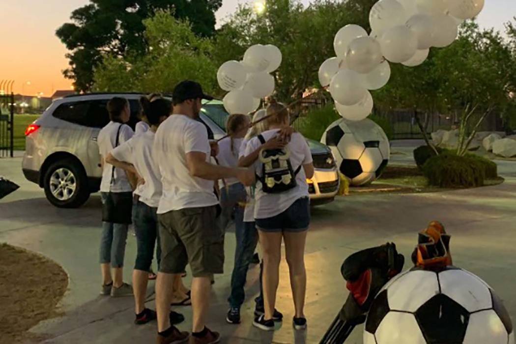 Mourners start arriving on Monday, Aug. 12, 2019, at Desert Breeze Park for a candlelight vigil ...