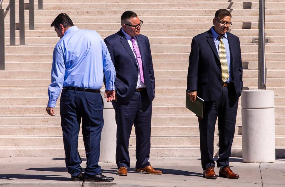 Defendants Bradley Campos, left, Diego Garcia and Cesar Morales depart the Lloyd D. George Cour ...