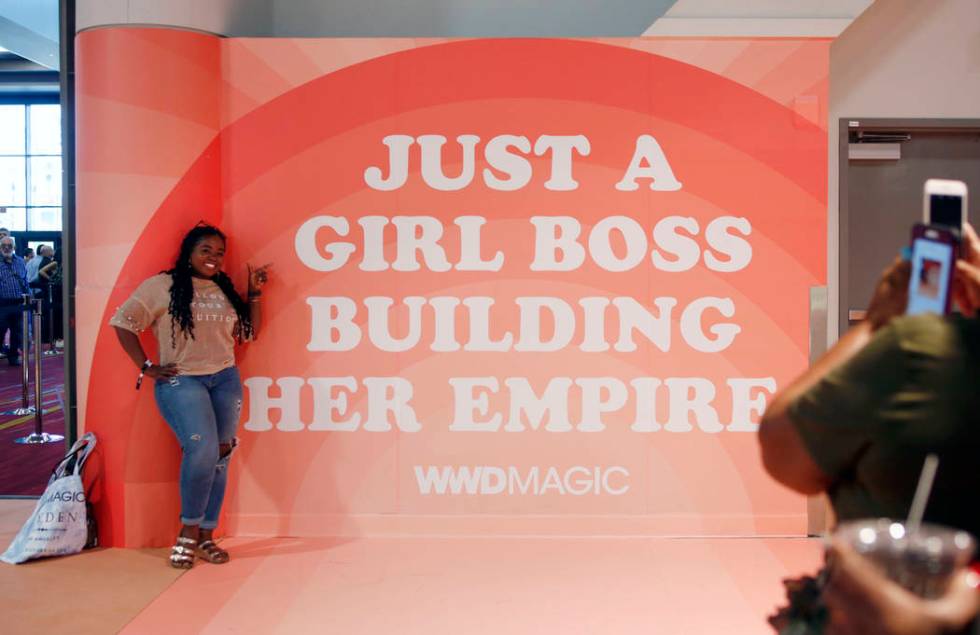 Owner of Buy Me Boutique Jessica Hall poses during the first day of the MAGIC trade show at the ...