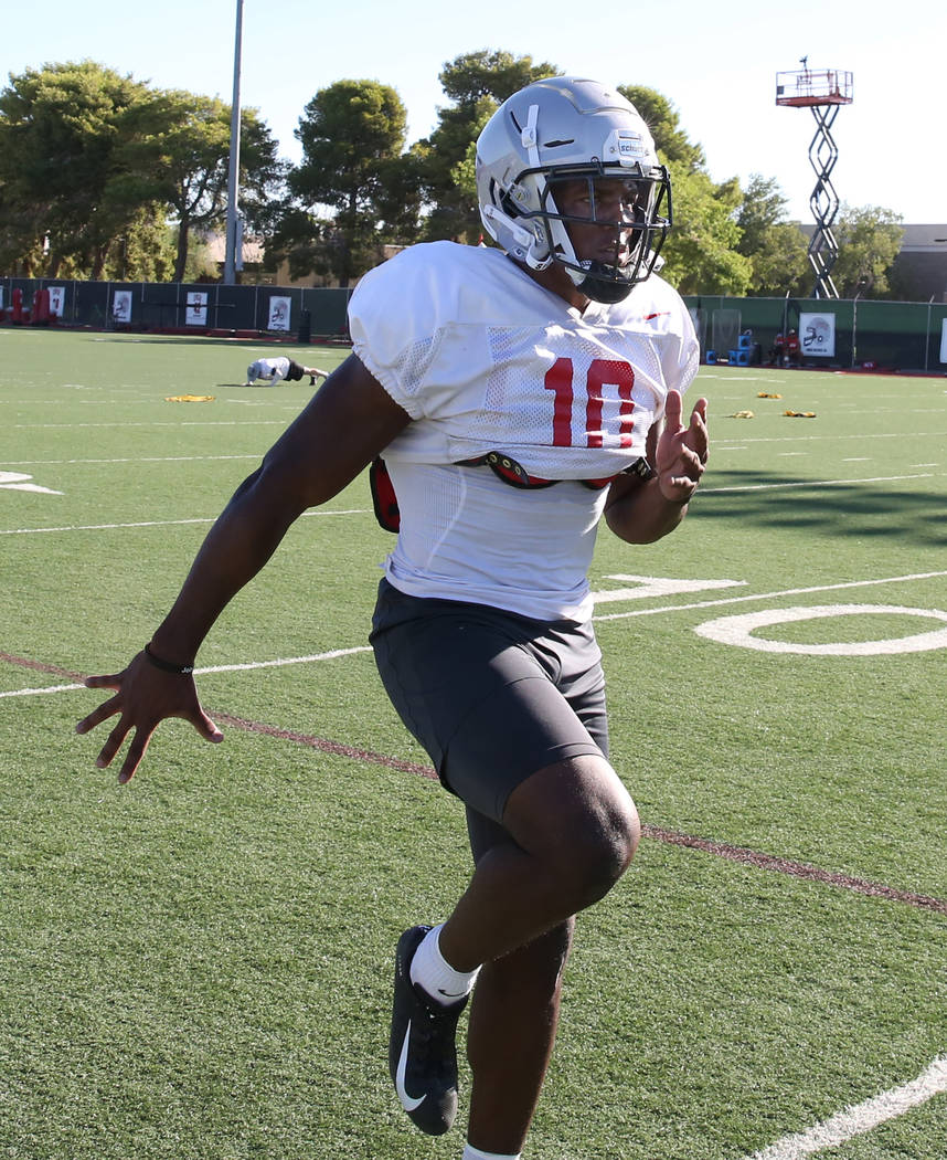 UNLV Rebels wide receiver Darren Woods Jr. (10) warms up during team practice on Tuesday, Aug. ...