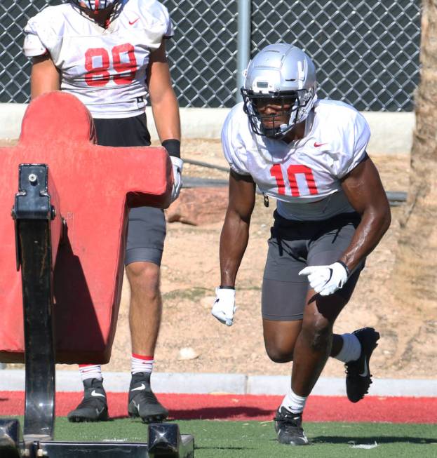 UNLV Rebels wide receiver Darren Woods Jr. (10) prepares to hits the sled during team practice ...