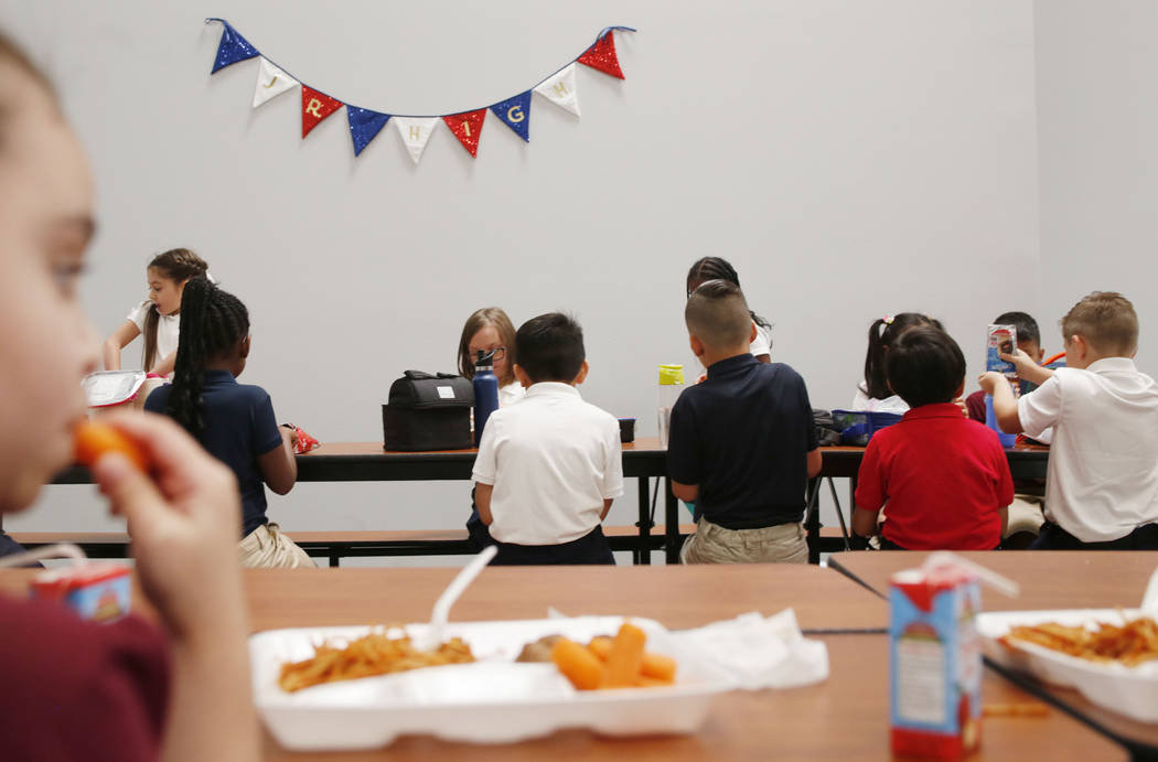 Legacy Traditional School students eat lunch during the opening week of the southwest Las Vegas ...