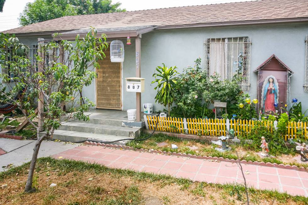 A house in Compton with a statue of the Virgin of Guadalupe outside. (Getty Images)