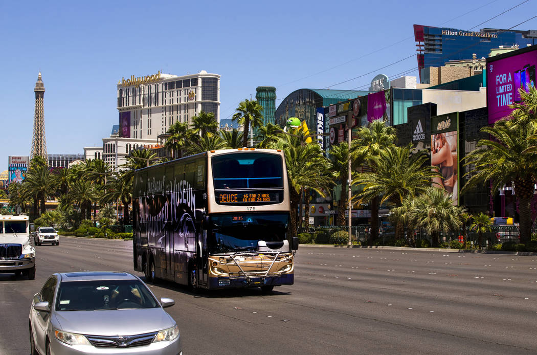 An RTC bus passes the New York-New York driving down the Strip on Tuesday, Aug. 13, 2019 in Las ...