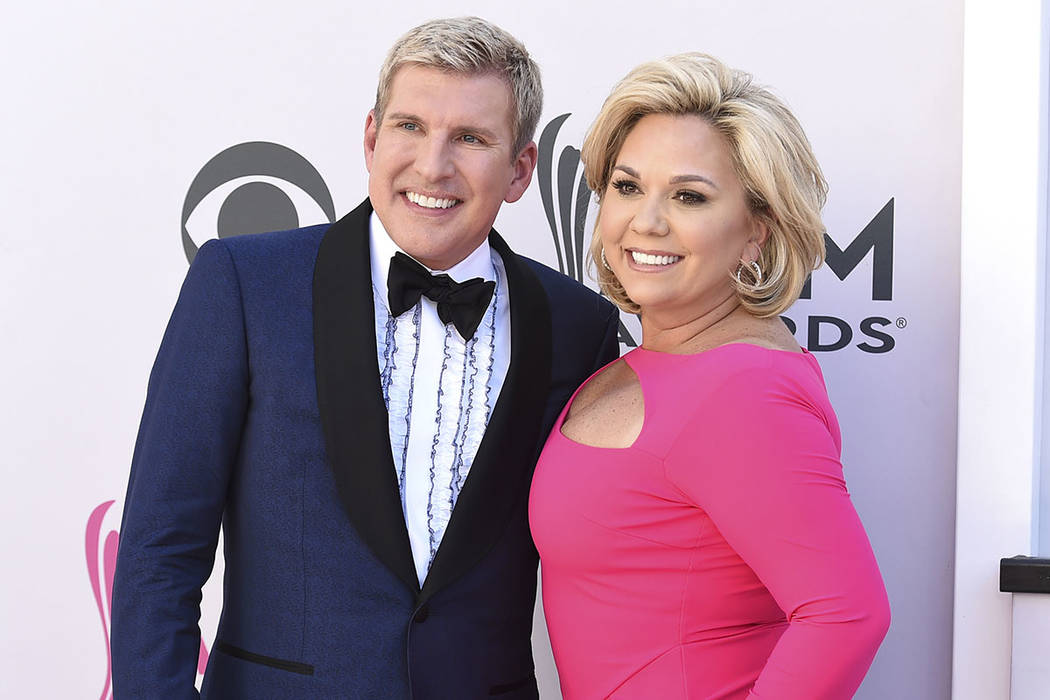 FILE-Todd Chrisley, left, and Julie Chrisley arrive at the 52nd annual Academy of Country Music ...