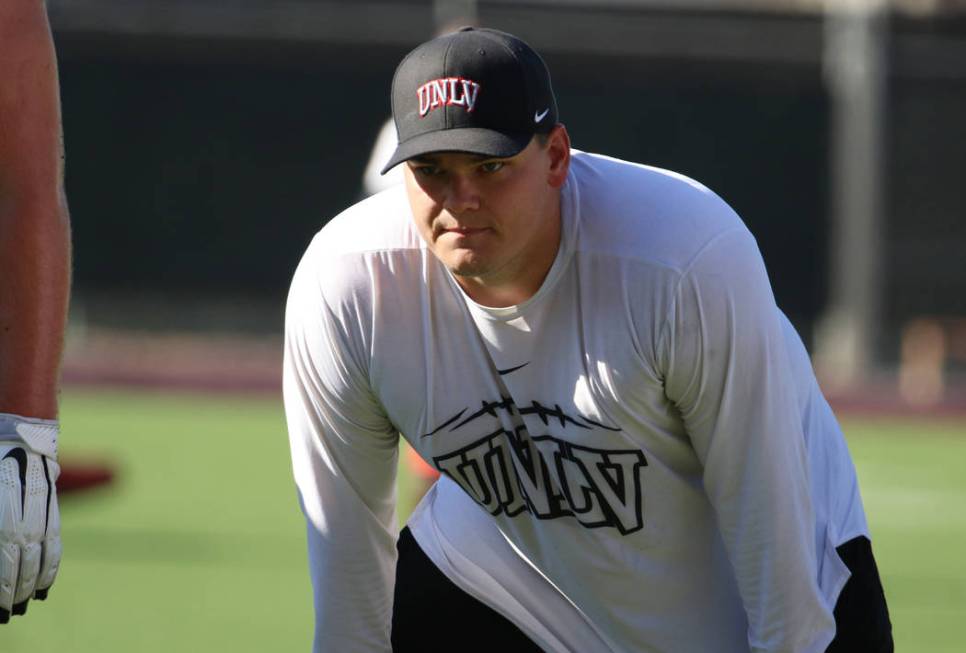 UNLV Rebels graduate assistant coach Will Kreitler watches his players during team practice on ...