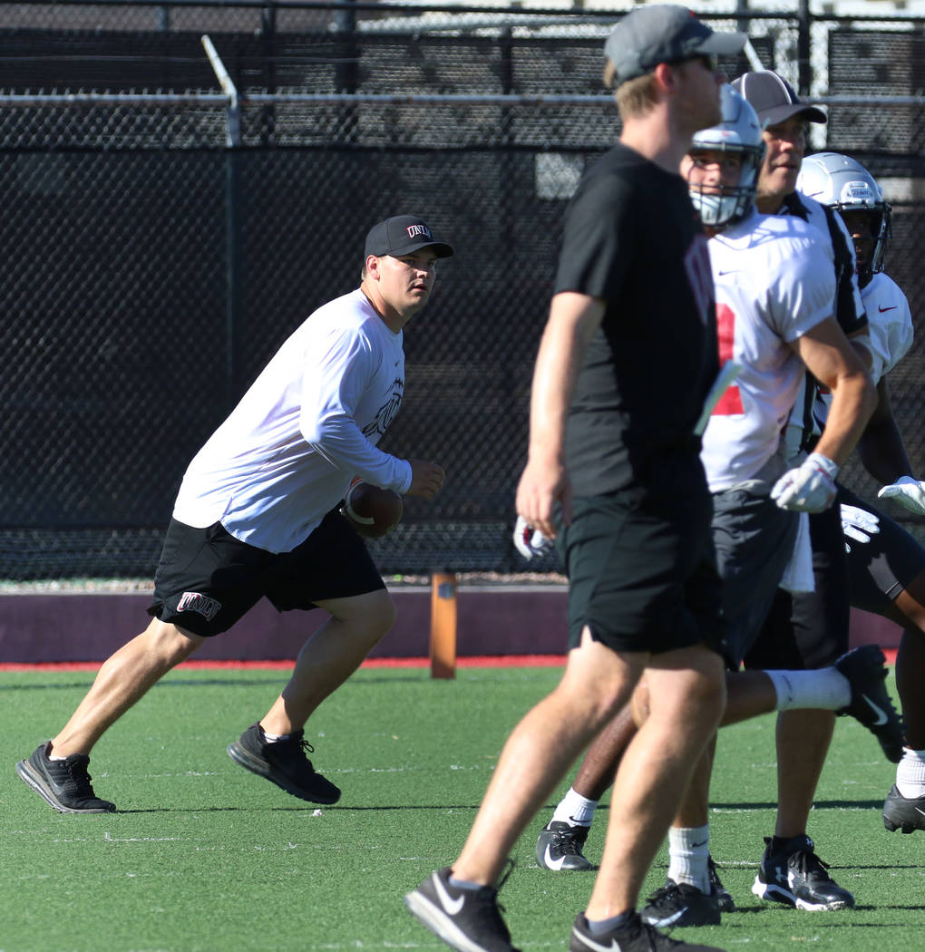 UNLV Rebels graduate assistant coach Will Kreitler watches his players during team practice on ...