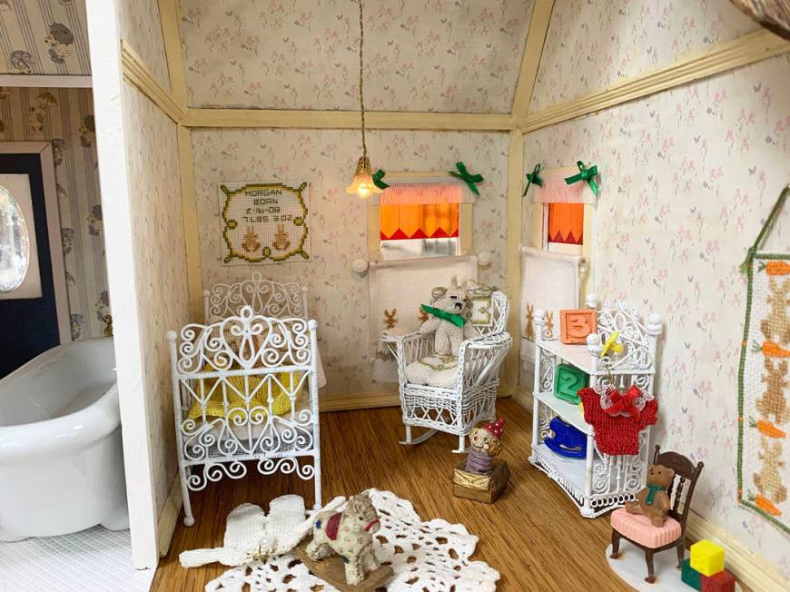 Vicki Ashenfelter, 76, mainly focused on a baby bedroom on the second floor of the Victorian do ...