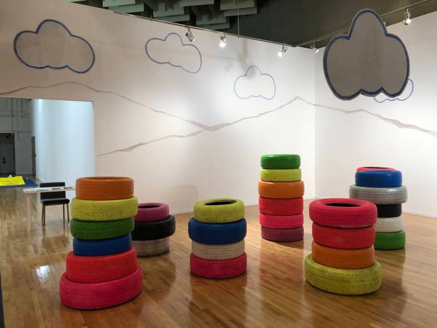 "Seven Magic Tires" art installation created by Ramiro Gomez and Justin Favela was initially pa ...