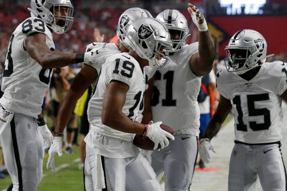 Oakland Raiders wide receiver Ryan Grant (19) celebrates his touchdown against the Arizona Card ...
