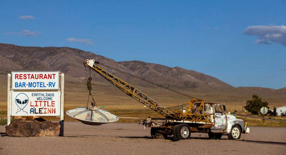 A spaceship hanging from a tow truck marks the entrance to the Little A'Le'Inn which is to be a ...