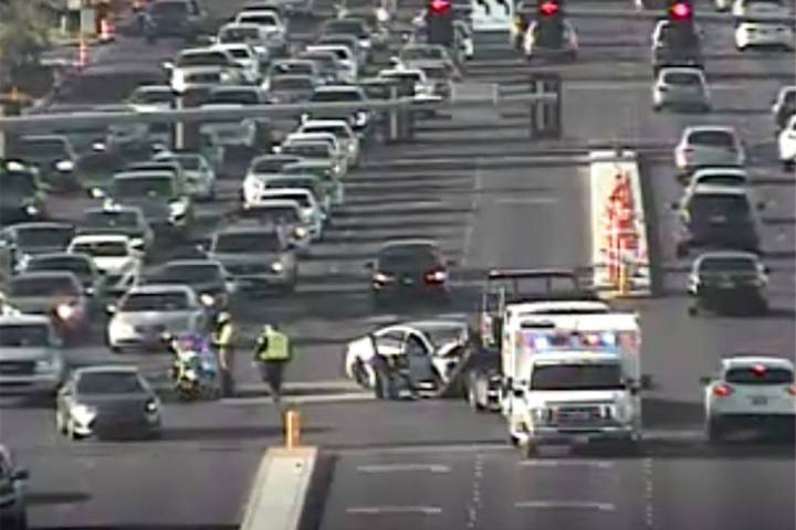 Las Vegas police respond to a crash at South Rainbow Boulevard and West Post Road on Thursday, ...