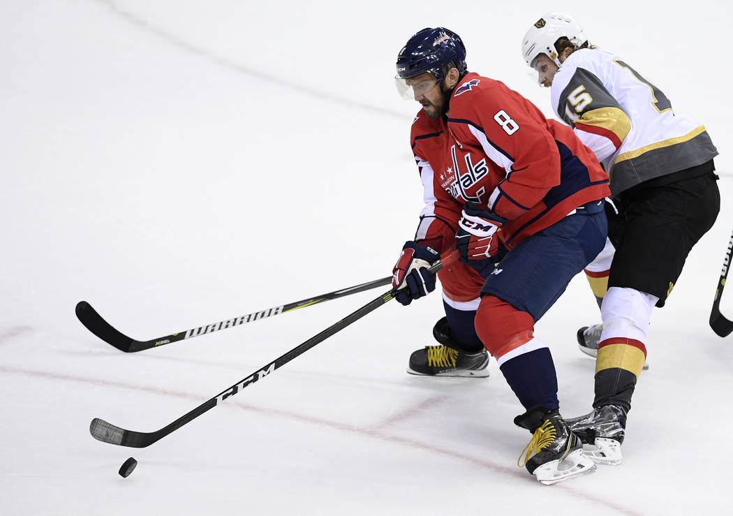 Washington Capitals left wing Alex Ovechkin (8), of Russia, skates with the puck against Vegas ...