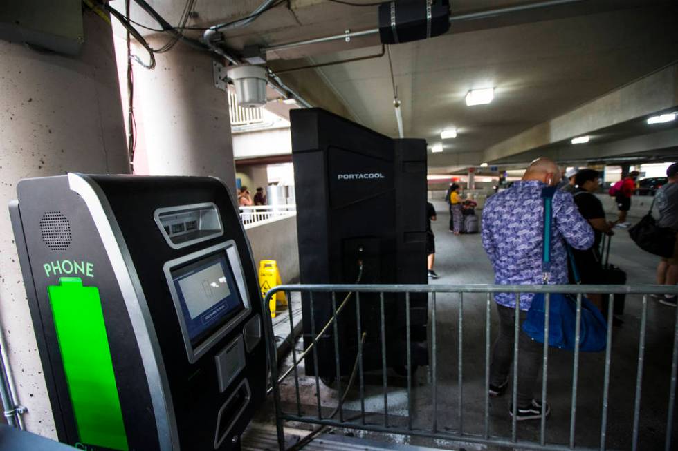 A vending machine offering portable batteries in the rideshare area at Terminal 1 at McCarran I ...