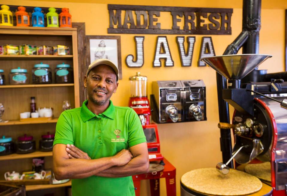 Solomon Teklu, owner of Java Tree, poses for a portrait his store at Flamingo Road and Decatur ...